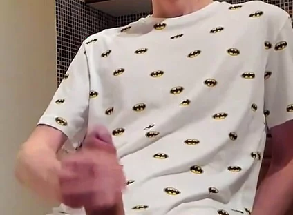 Sweet load of cum flows from this cute guy's big cock