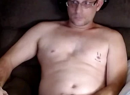Dubesnackes Sitting at His Computer Watching Some Porn on the Computer. so Come Watch Him Play with His Fat Juicy Cock.