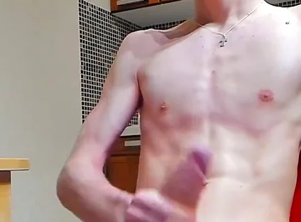 A young beautiful gay twink fucks a vibrator