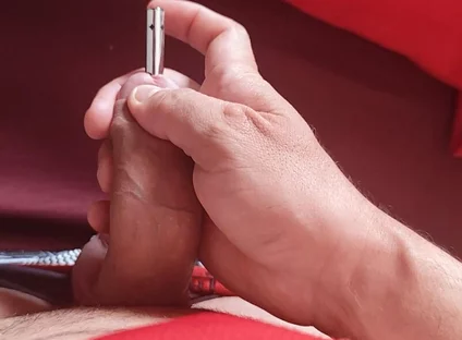 Sounding Strong the Foreskin Between the Trembling Glans.
