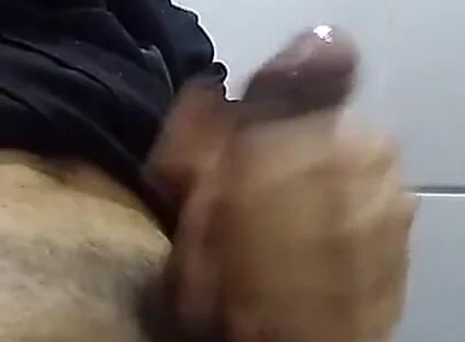 Young Man in the Public Bathroom